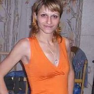 Натали Телига