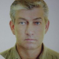 Олег Акинтиков