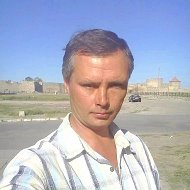 Олег Белый