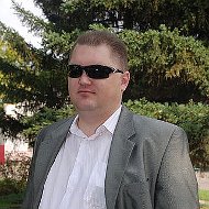 Евгений Комков