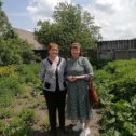 Фотография "На Троицу с сестрой во дворе родительского дома. "