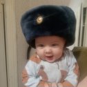 Фотография "Внук примеряет шапку дяди,ещё один солдат подрастает"
