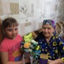 Фотография "Доча  Арина  поздравляет бабушку с Днём рождения! "