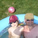 Фотография "Дочка с мужем в бассейне летом у деда. "