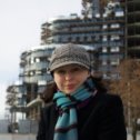Фотография "Я на фоне бизнес-центра "Риверсайд-Дон" на набережной, который строит компания, где я работаю.
Январь 2009"