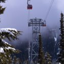 Фотография "Peak 2 Peak Gondola

Canada, British Columbia, Whistler Mountain, Mar 22, 2024 Гондольный подъемник Гондола Peak 2 Peak - это трехколесный гондольный подъемник на курорте Уистлер-Блэккомб в Уистлере, Британская Колумбия, соединяющий Roundhouse Lodge на горе Уистлер и Rendezvous Lodge на горе Блэккомб. Это первый подъемник, который соединяет две соседние горы. Он удерживал мировой рекорд по самому длинному свободному пролету между башнями канатной дороги в 3,03 километра до 2017 года, когда канатная дорога Эйбзее превысила его на 189 метров. Это по-прежнему самая высокая точка над землей в гондоле - 436 метров, хотя временная канатная дорога в Швейцарии, использовавшаяся с 1979 по 1986 год, имела больший пролет. Гондола была построена группой Doppelmayr Garaventa Group в 2007 и 2008 годах стоимостью 51 миллион канадских долларов."