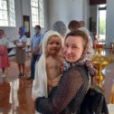 Фотография "Дочь Самойловых Оксана. В церкви на крещении сына."
