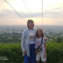 Фотография "Лариса с Лизой высоко в горах на фоне вечерней Алматы. 2023 г."
