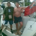 Фотография "Турция, Marmaris 2009, Мой друг Андрей (он же капитан) и я (матрос этой же яхты)"
