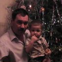 Фотография "это я с внуком на Новый год"