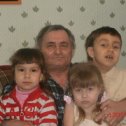 Фотография "папа с внуками"