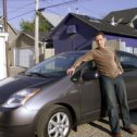 Фотография "Я с моей первой машиной
(Toyota Prius)
расход 5.6 на 100 км или 42 miles per gallon"