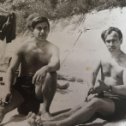 Фотография "Отец с братом на приморском пляже"