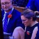 Фотография "Дочь укр. нациста стрежет ногти на ногах в парламенте Канады. "