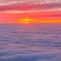 Фотография "Восход из иллюминатора самолёта"