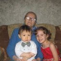 Фотография "Birthday Boy with Ivette and grandma. Feb 23, 2011"