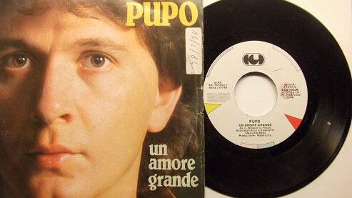 Пупо певец песни слушать. Un Amore grande Пупо. Pupo 1996. Альбом Пупо 1984 года. Певец Пупо альбом.