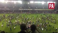 BREAKING  Millwall fans on the pitch after getting through t...