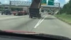 Driver Witnesses Dump Truck Crash Into Highway Sign in Jacin...