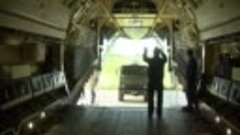 Погрузка автоцистерн в самолеты Ил-76 для отправки в зону на...