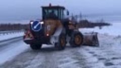 Уборка снежного вала на дороге Южноуральск-Магнитогорск. Вид...