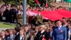 День флага, герба и гимна отмечают в Беларуси – большой флаг...