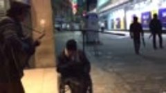 Homeless man joins busker for spontaneous New Year&#39;s Eve str...