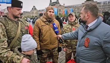 Участники СВО дали интервью на параде Победы в Москве