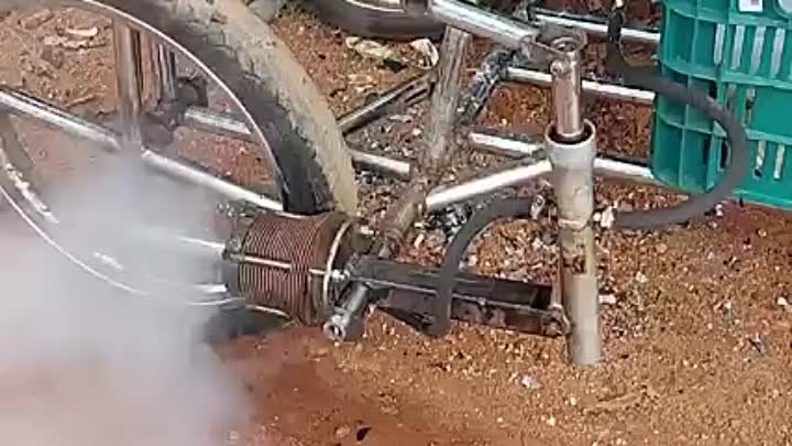 Трицикл работающий на дровах.