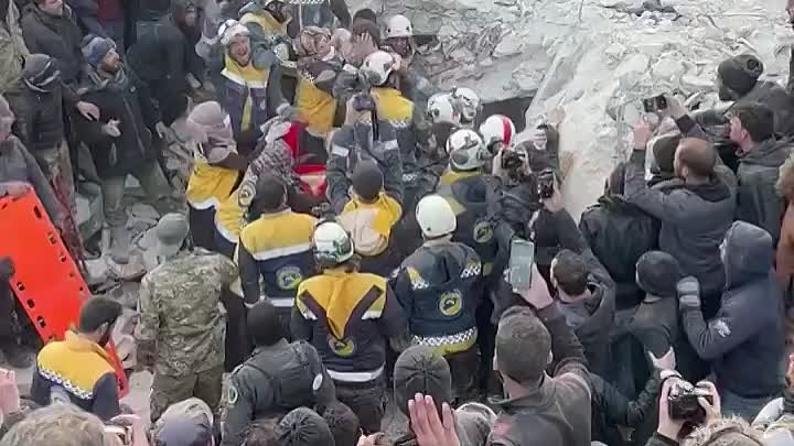 The joy of civil defense personnel and civilians while extracting tw ...