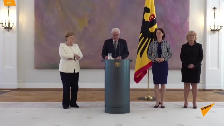 Merkel tremură din nou