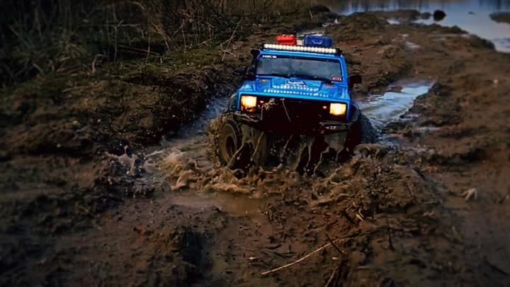 Water and mud game with four-wheel drive RC Jeep Cherokee