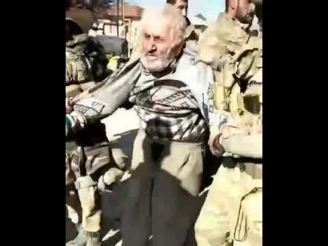 Таджик без уха. Армянский старик в плену. Обезгловление армянского старика. Режут голову армянскому старику.