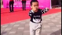 Chinese Kid Upstages Dancers