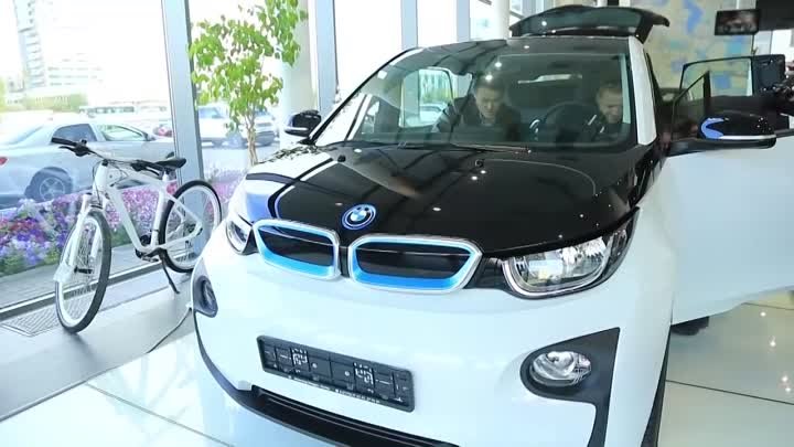 Вручение BMW i3 по акции 'Удачные пакеты'
