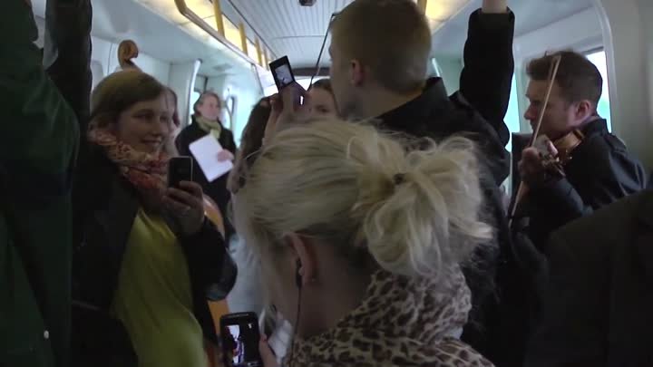 Flash mob in the Copenhagen Metro. Copenhagen Phil playing Peer Gynt.