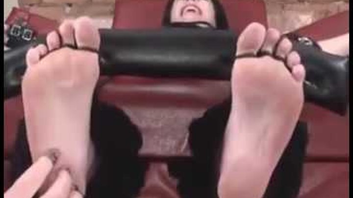 Tickling girl feet.