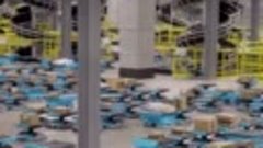 Роботы на заводе Amazon.