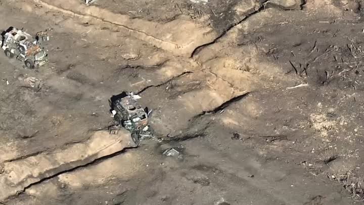 6 Вид с дрона на Работино и его окрестности. Видно много остовов битой техники и практически полностью уничтоженное село.